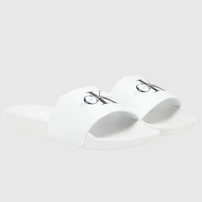 Chanclas Calvin Klein...