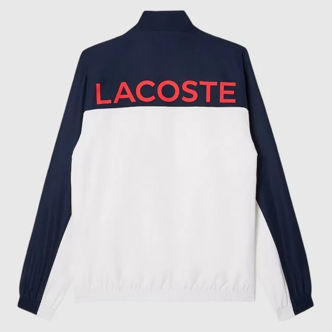 Chándal Lacoste Azul Marino y Blanco...